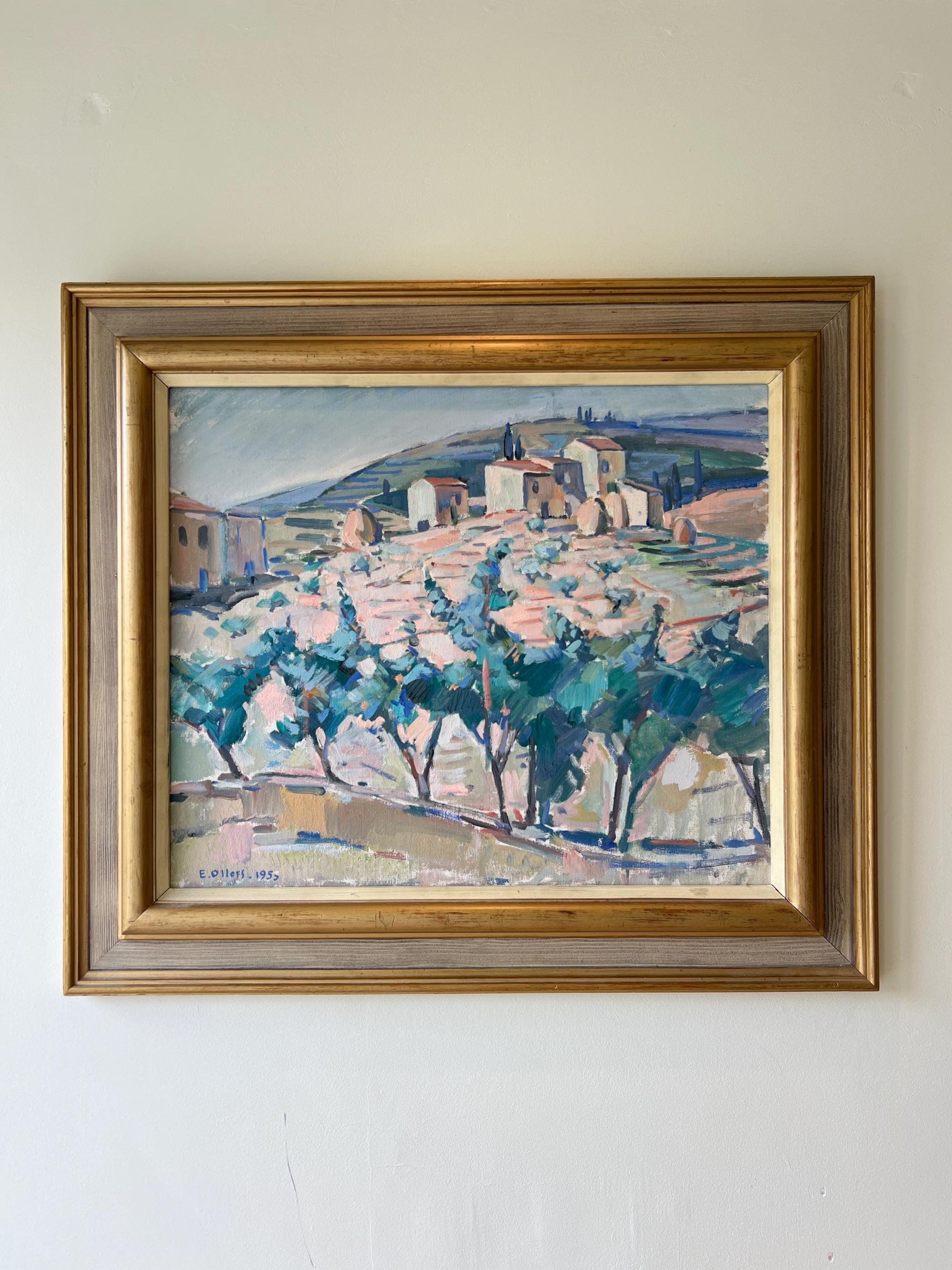 Framed vintage oil painting of a village scene with trees in a vintage gilt frame, available at Hue.
