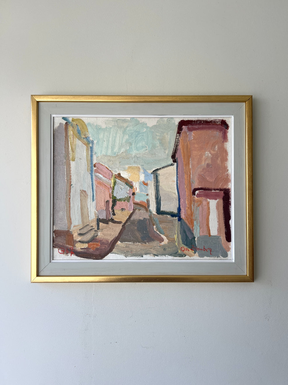 Framed vinatge oil painting of a street scene in pastel colours. Available at Hue. 