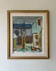 Framed vintage oil painting of a waterfront landscape with buildings and trees. Available at Hue. 