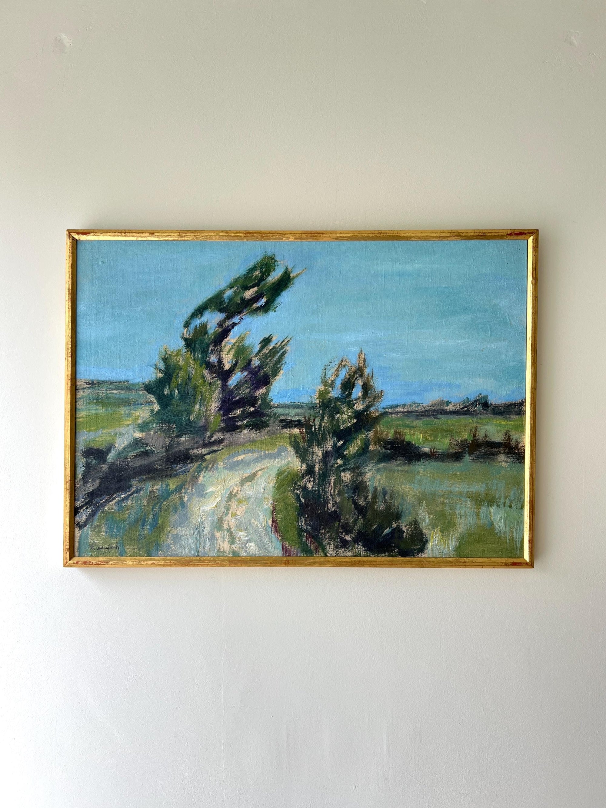 Framed vintage oil painting of a landscape with trees and a path in a slim gilt frame, available at Hue.