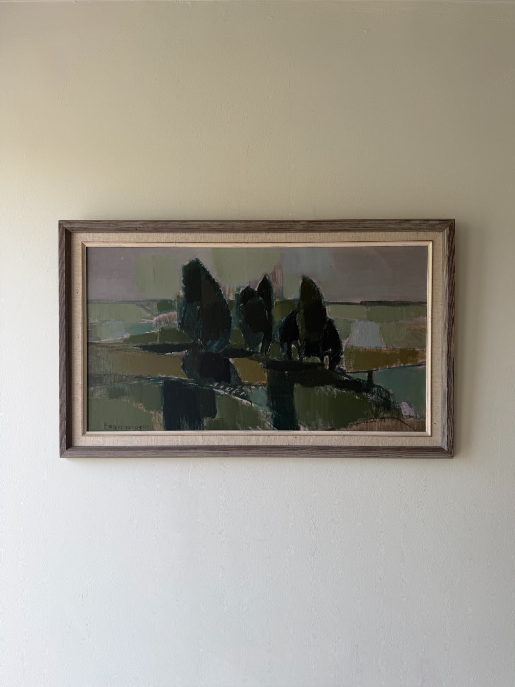 Framed vintage oil painting of a landscape with trees. Available at Hue. 