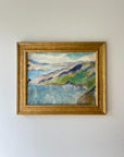 Framed vintage oil painting of a seascape with hills in a gilt frame, available at Hue. 