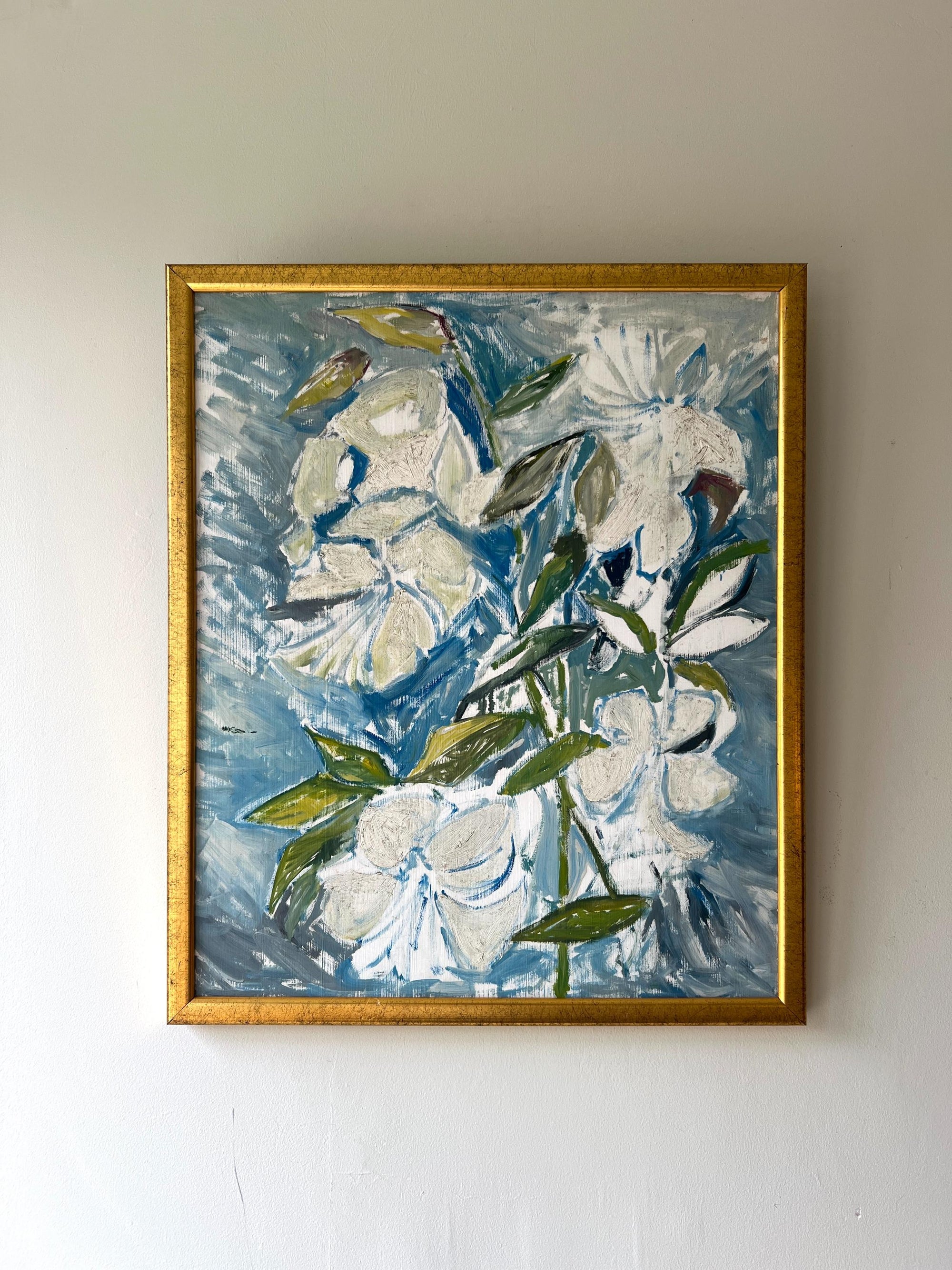 Framed vintage painting of white flowers on a blue background, available at Hue.