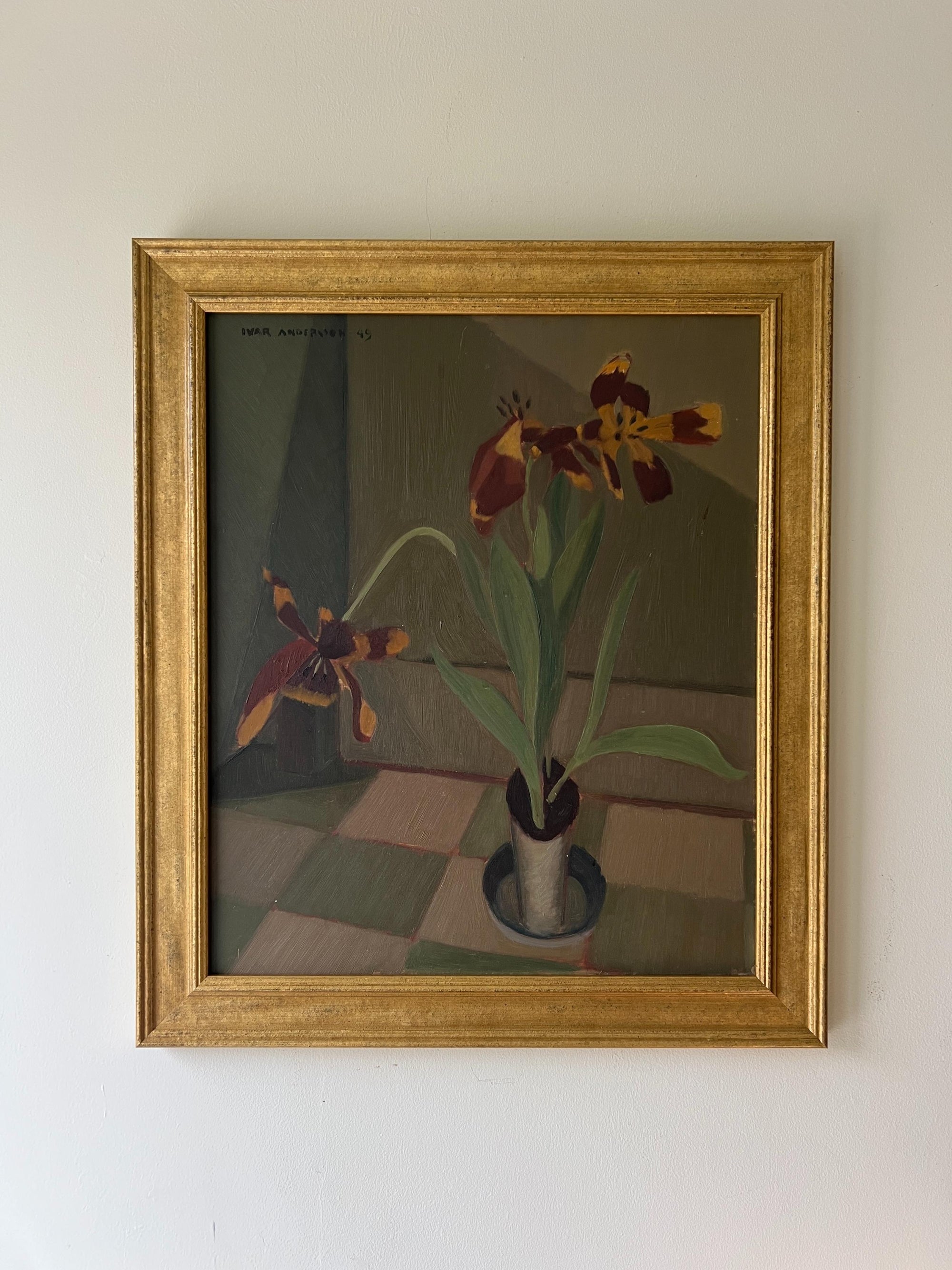 A framed vintage still life  oil painting of tulips. Available at Hue. 