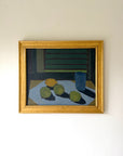 Framed vinatge oil painting of still life with lemons, limes and a glass. Available at Hue. 