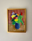 Framed vintage oil painting of a vase with flowers. Available at Hue. 