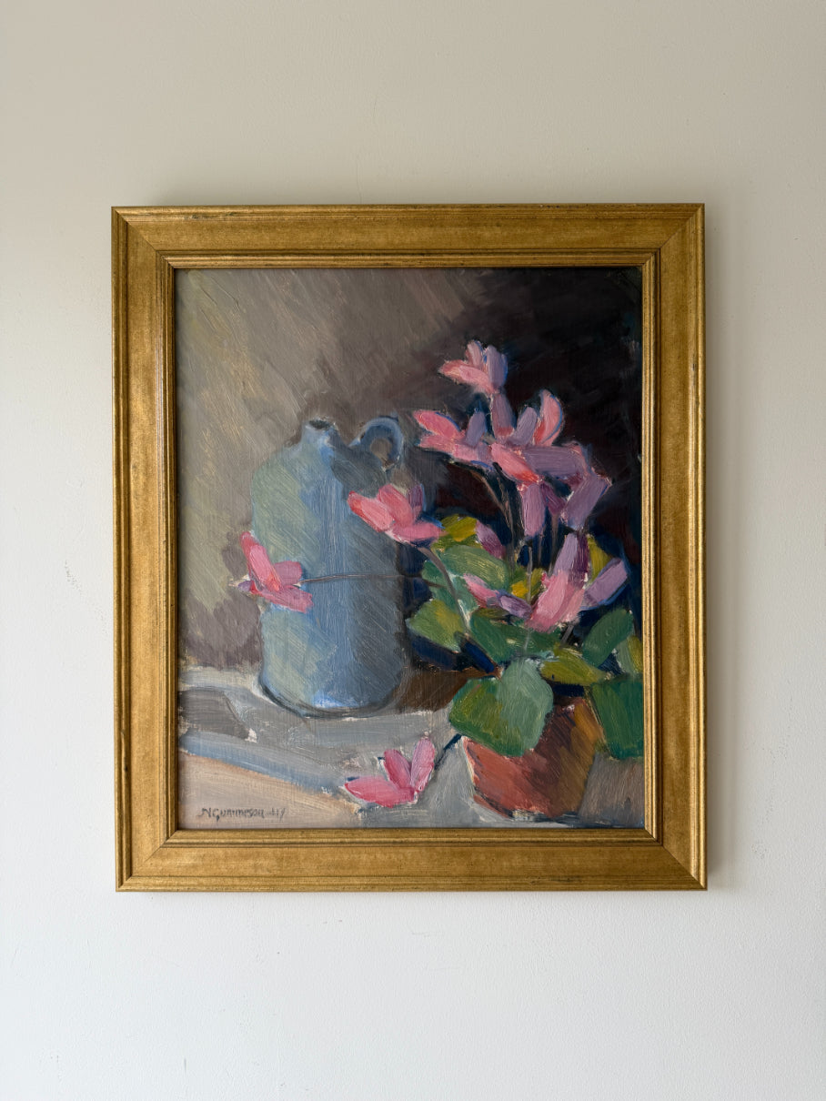 Framed vintage oil painting of a still life with pink flowers and a blue pitcher. Available at Hue. 