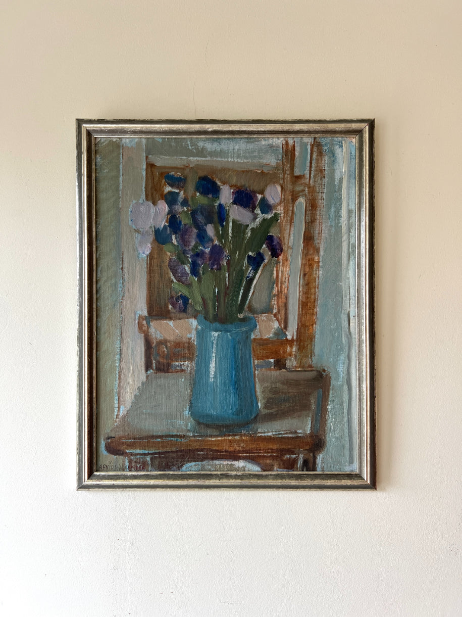Framed vintage oil painting of a blue vase with flowers. Available at Hue.