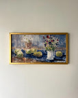 Framed vintage oil painting of a bouquet of flowers next to some scattered fruit, available at Hue.
