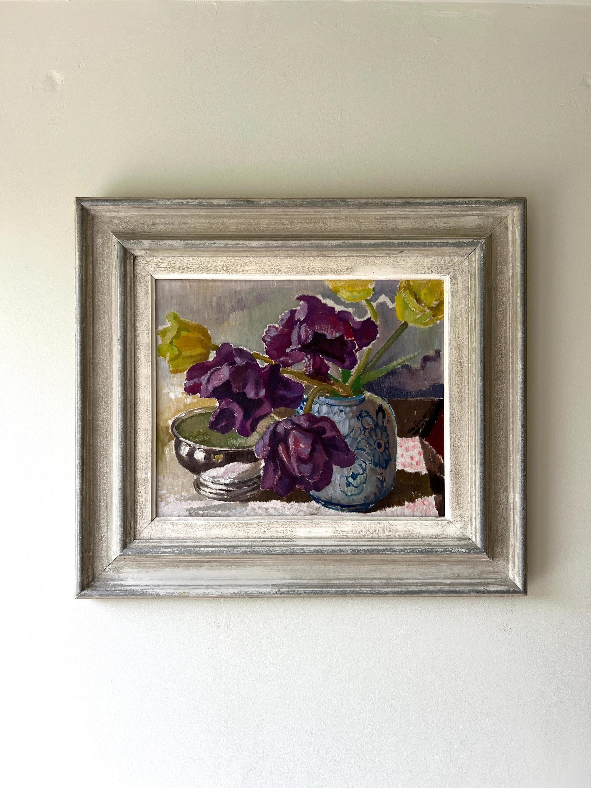 Framed vintage still life painting with purple and yellow tulip flowers and a blue and white vase, available  at Hue.