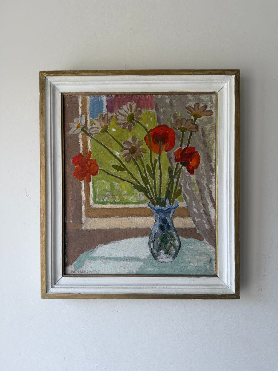 Framed vintage oil painting of wild flowers in a vase by a window. Available at Hue.