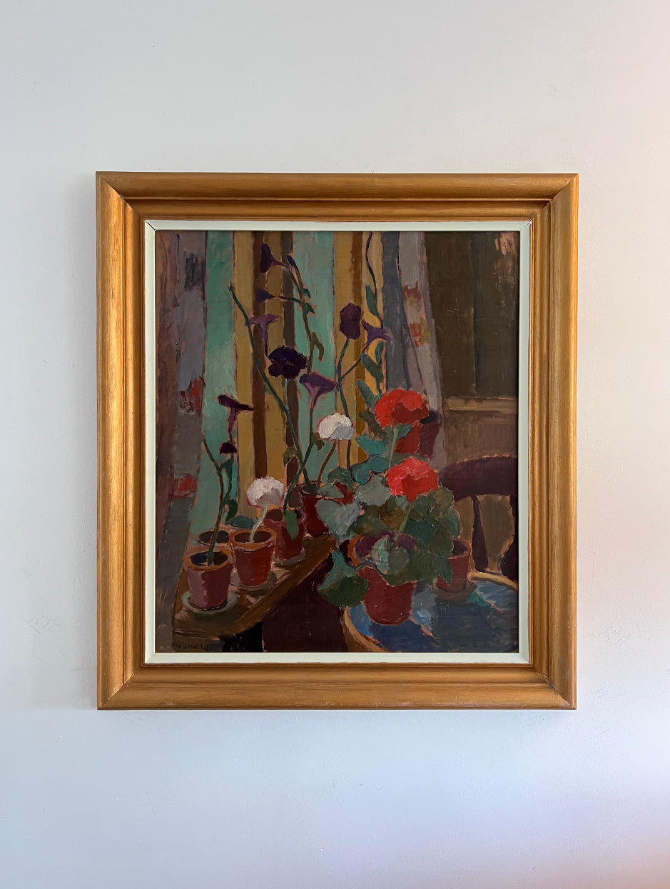 Framed vintage oil painting of potted geranium plants. Available at Hue.