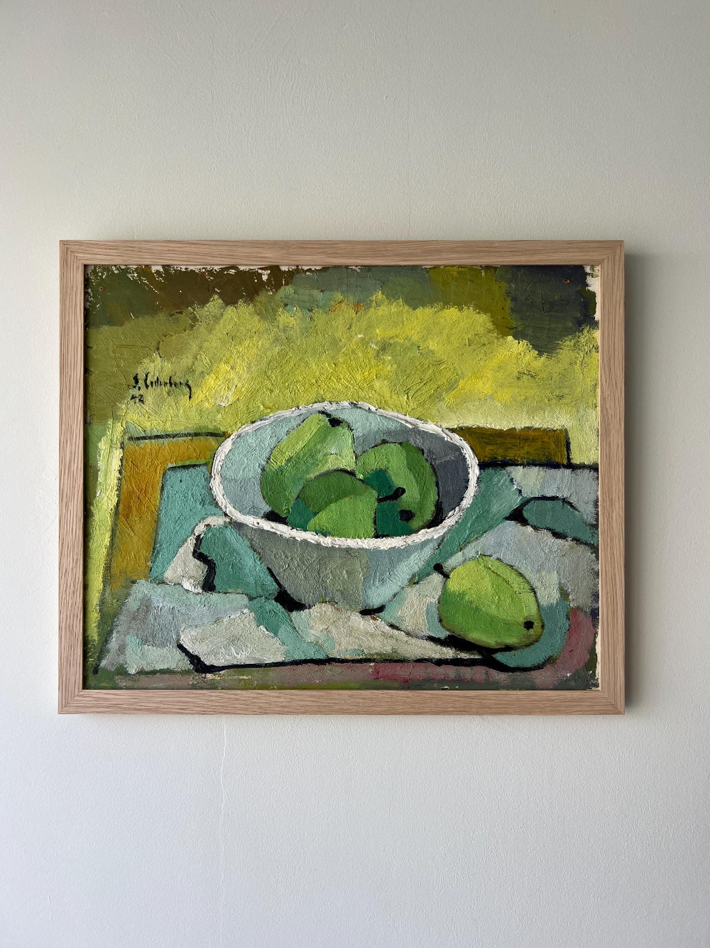 Framed vintage painting of a still life with a bowl of green apples in a solid oak frame, available at Hue.