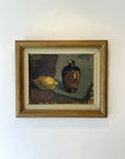 Framed vinatge still life oil painting of a lemon and vase. Available at Hue.