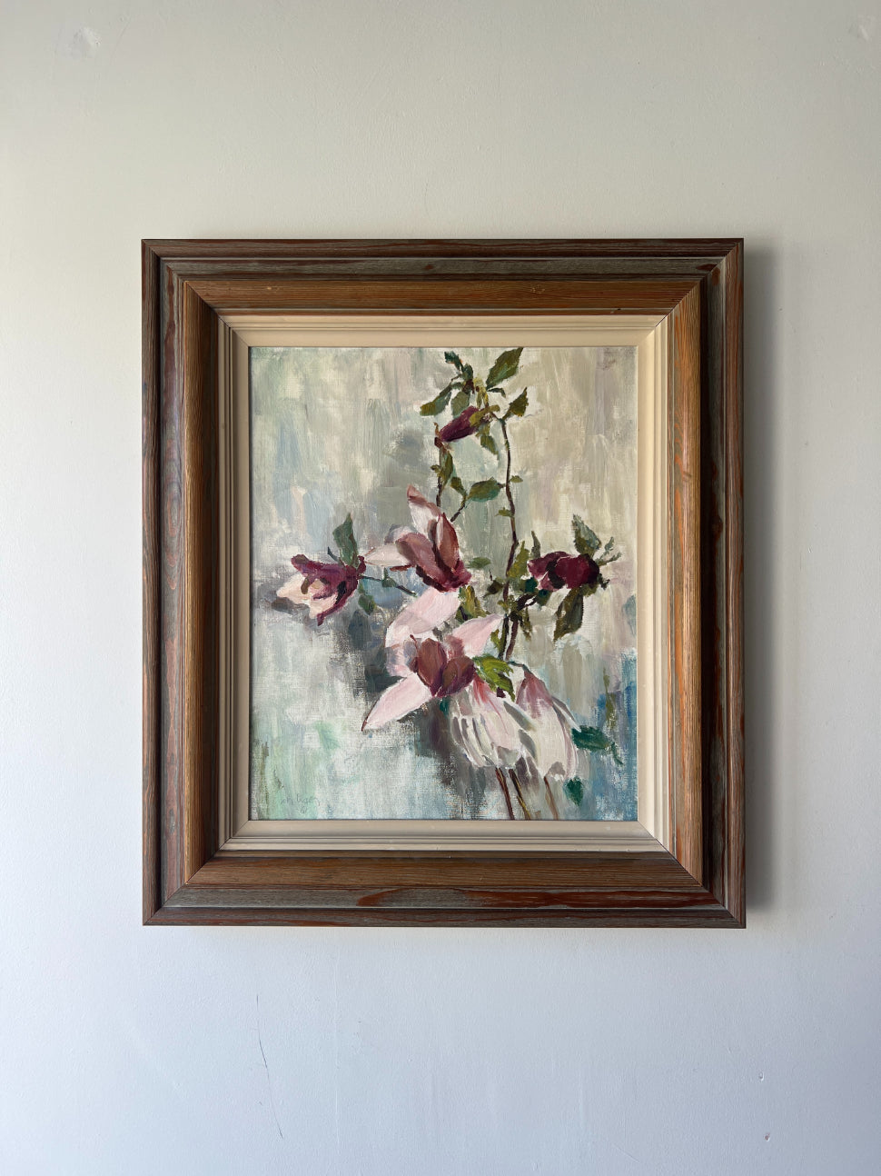 Framed vintage oil painting of magnolia flowers. Available at Hue. 