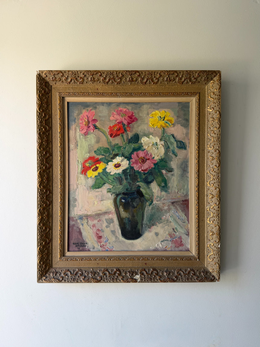 Framed vintage oil painting of flowers. Available at Hue. 