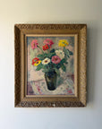 Framed vintage oil painting of flowers. Available at Hue. 