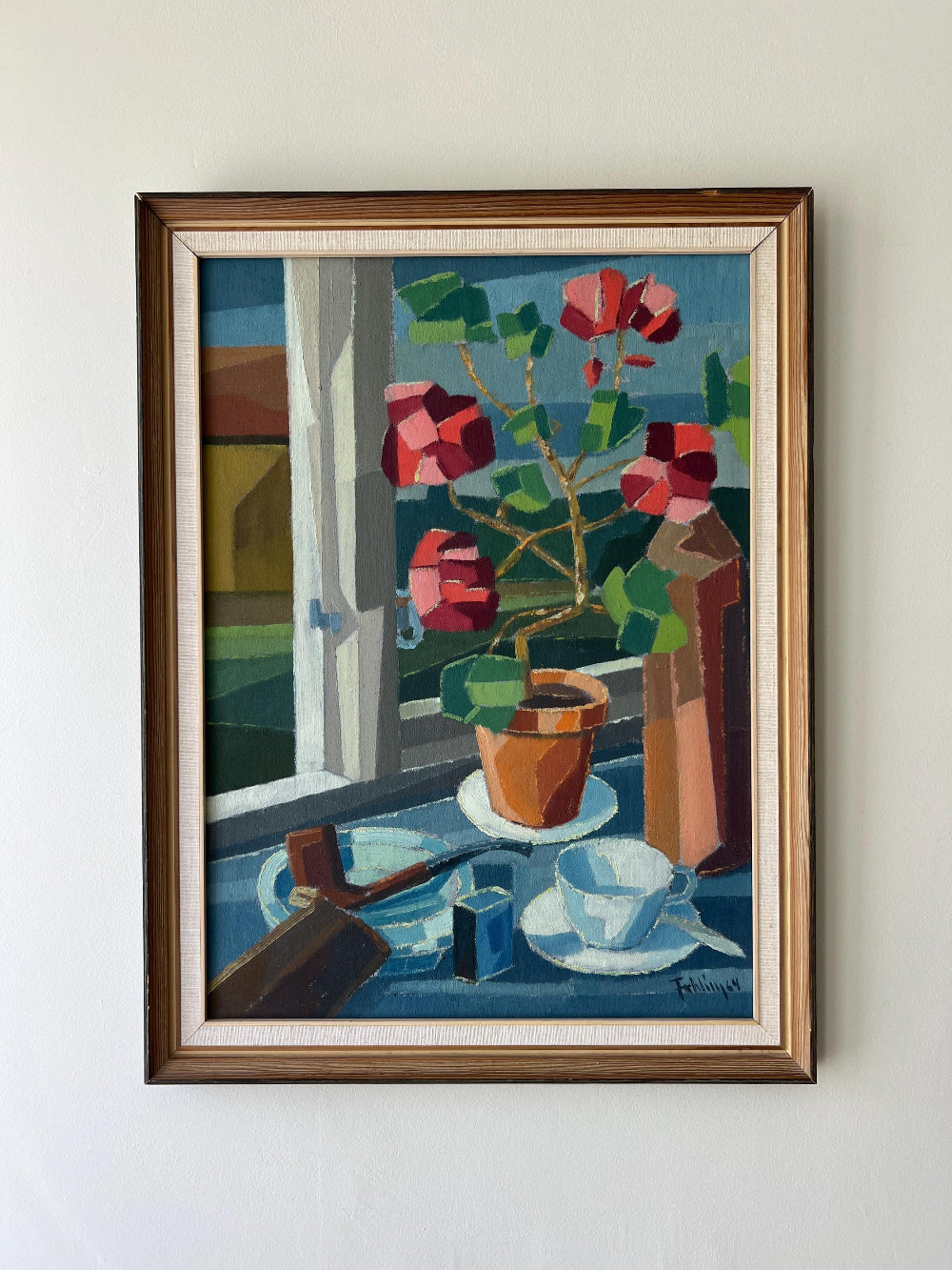 Framed vintage oil painting of a still life scene with flowers and a pipe on a table, available at Hue.