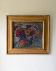 Framed vintage oil painting of a colorful bouquet of flowers. Available at Hue.