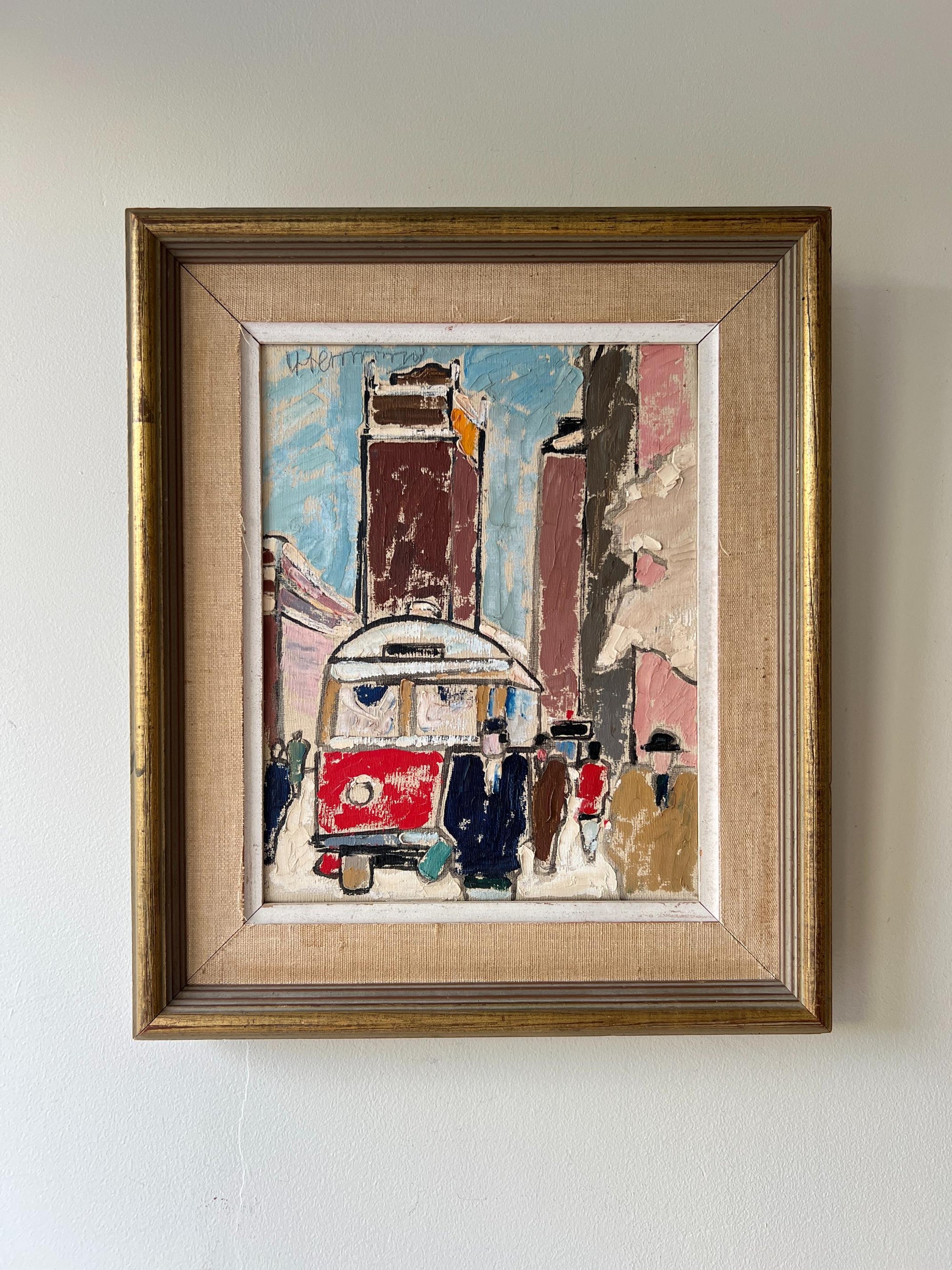 Framed vintage oil painting of a street scene with a tram, tall buildings and pedestrians, available at Hue. 