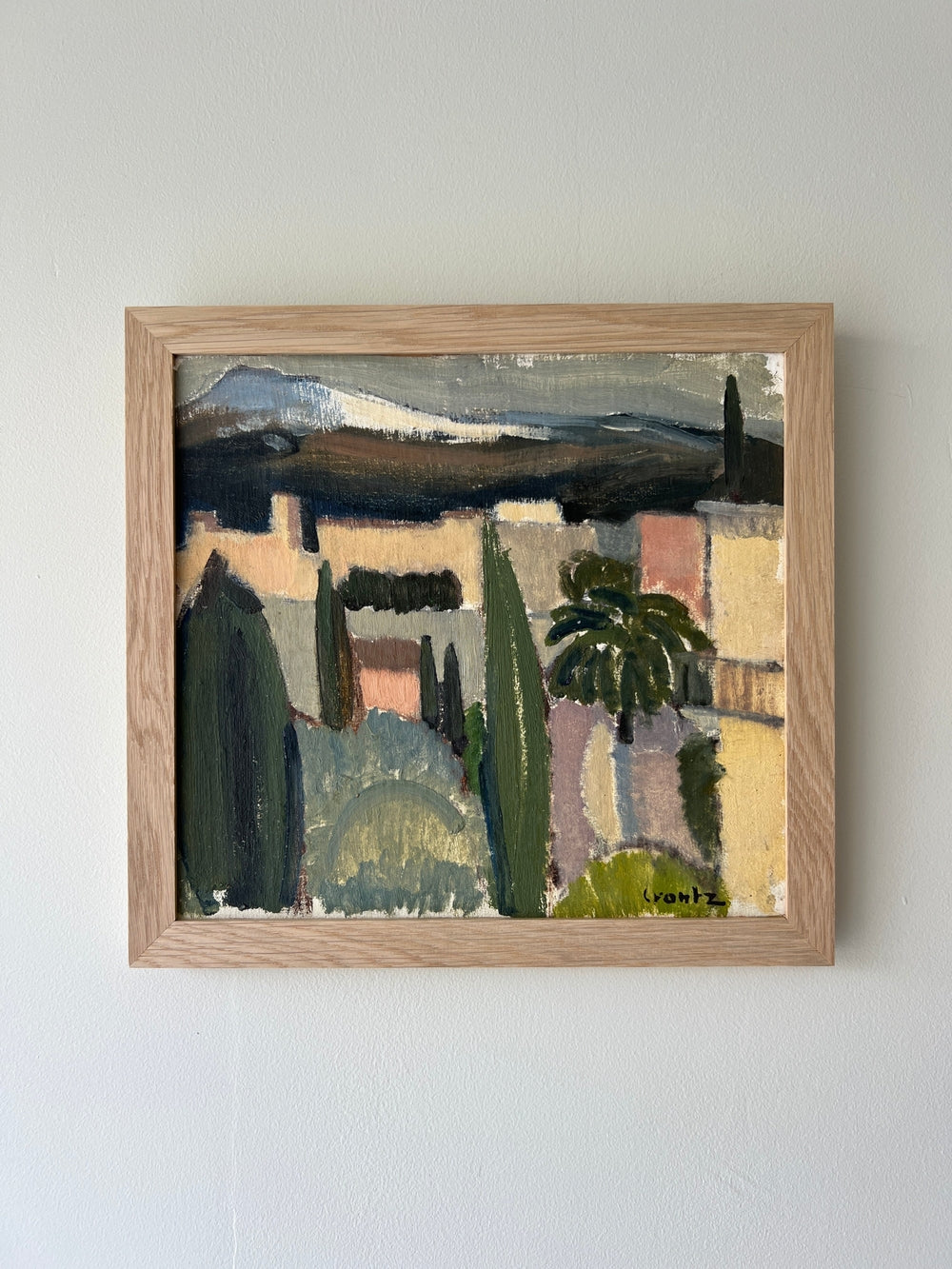 Framed square abstract painting of landscape scene in greens and pinks framed in oak available from hue
