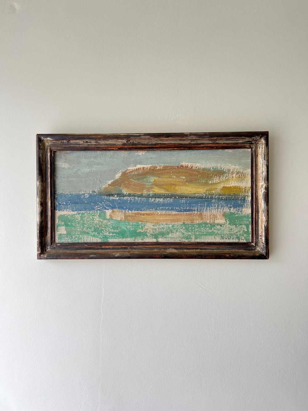 Framed abstract painting of landscape scene in blues and greens. available from hue.