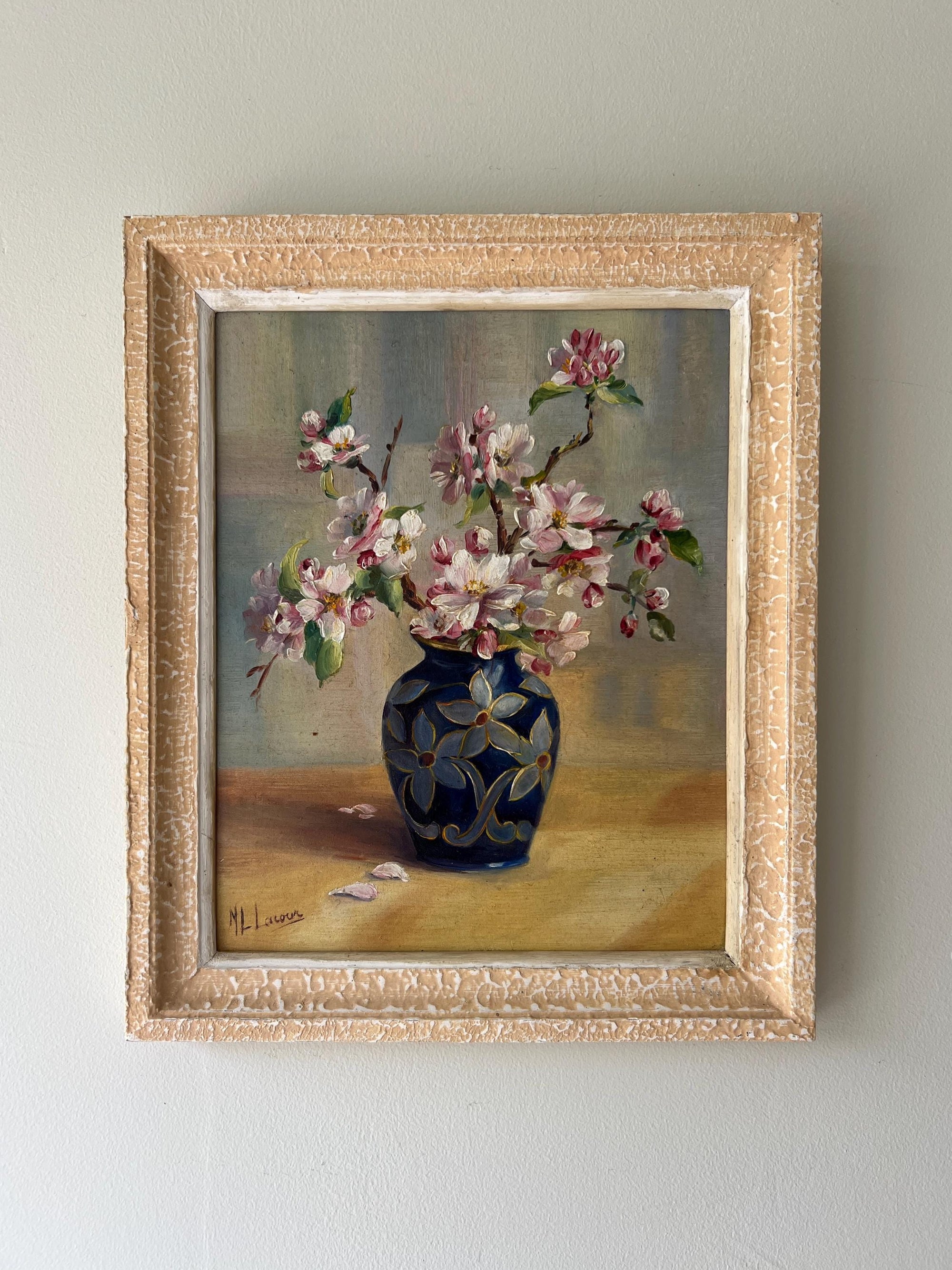 Framed painting of a blue vase with blossom flowers on a neutral, available from hue