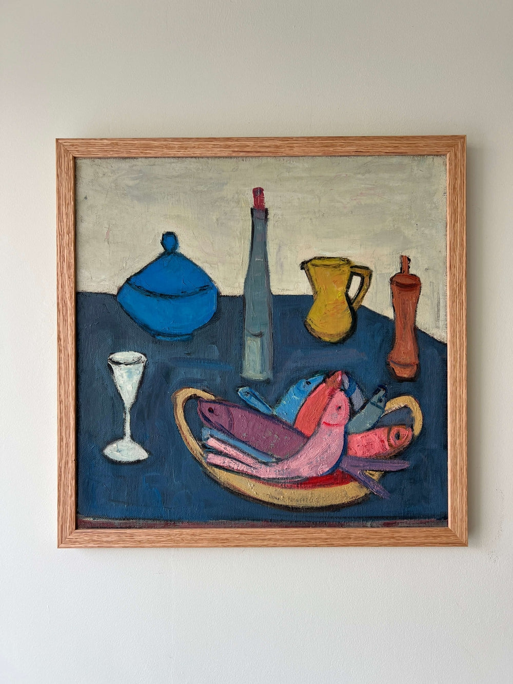A vintage oil painting of still life objects on a  blue table. Flat shapes in post-cubist, mid-century style, available at Hue.