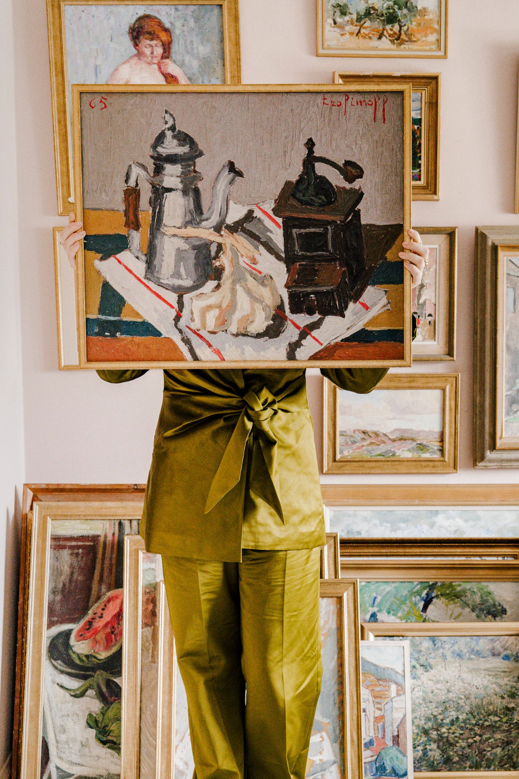 Original French mid-century vintage art still life painting featuring a coffee pot and grinder, displayed among a collection of vintage paintings.