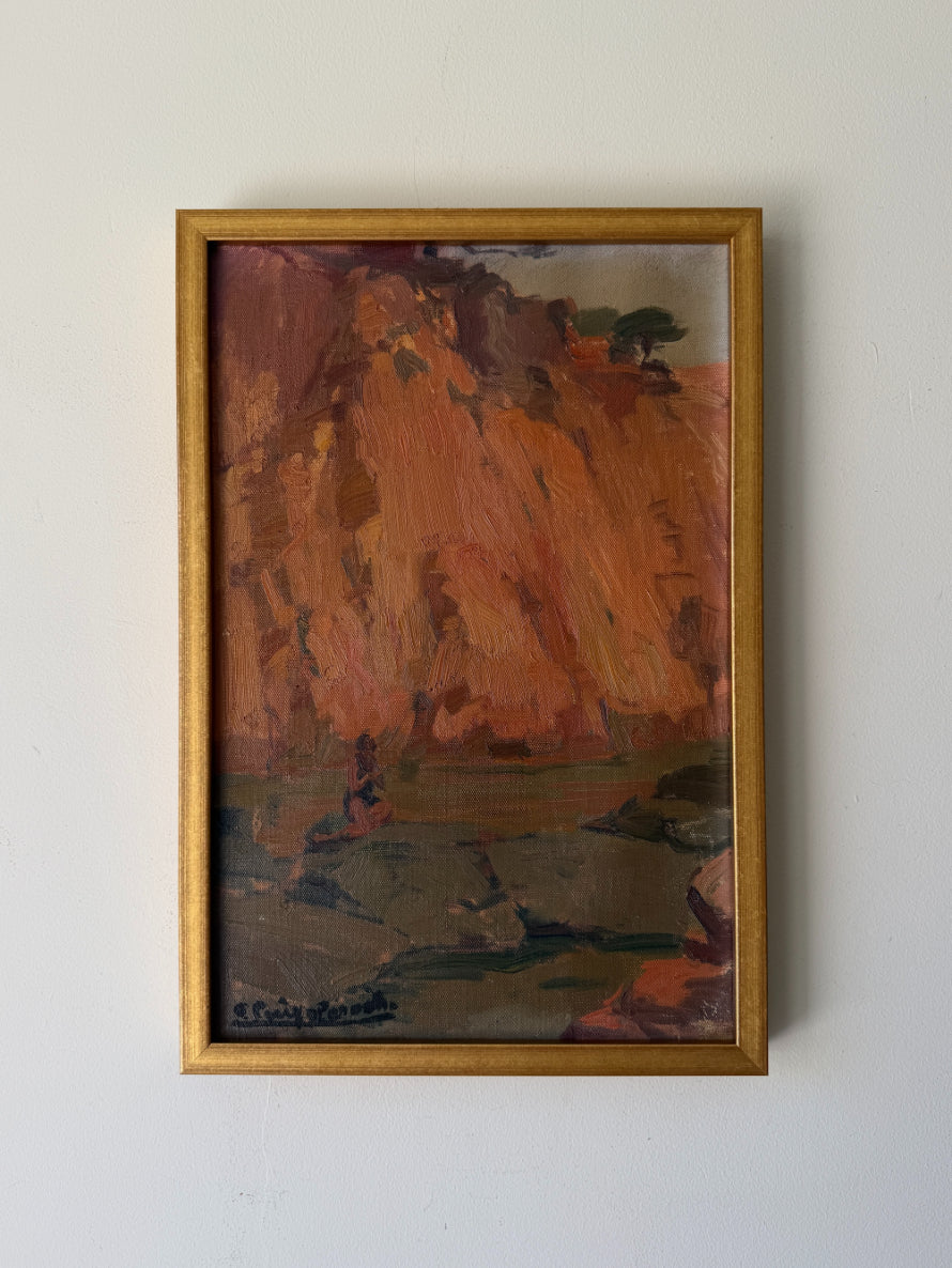 A framed vintge  landscape oil painting featuring textured brushstrokes of warm orange, brown, and muted green tones, housed in a gold-toned frame. Available at Hue.