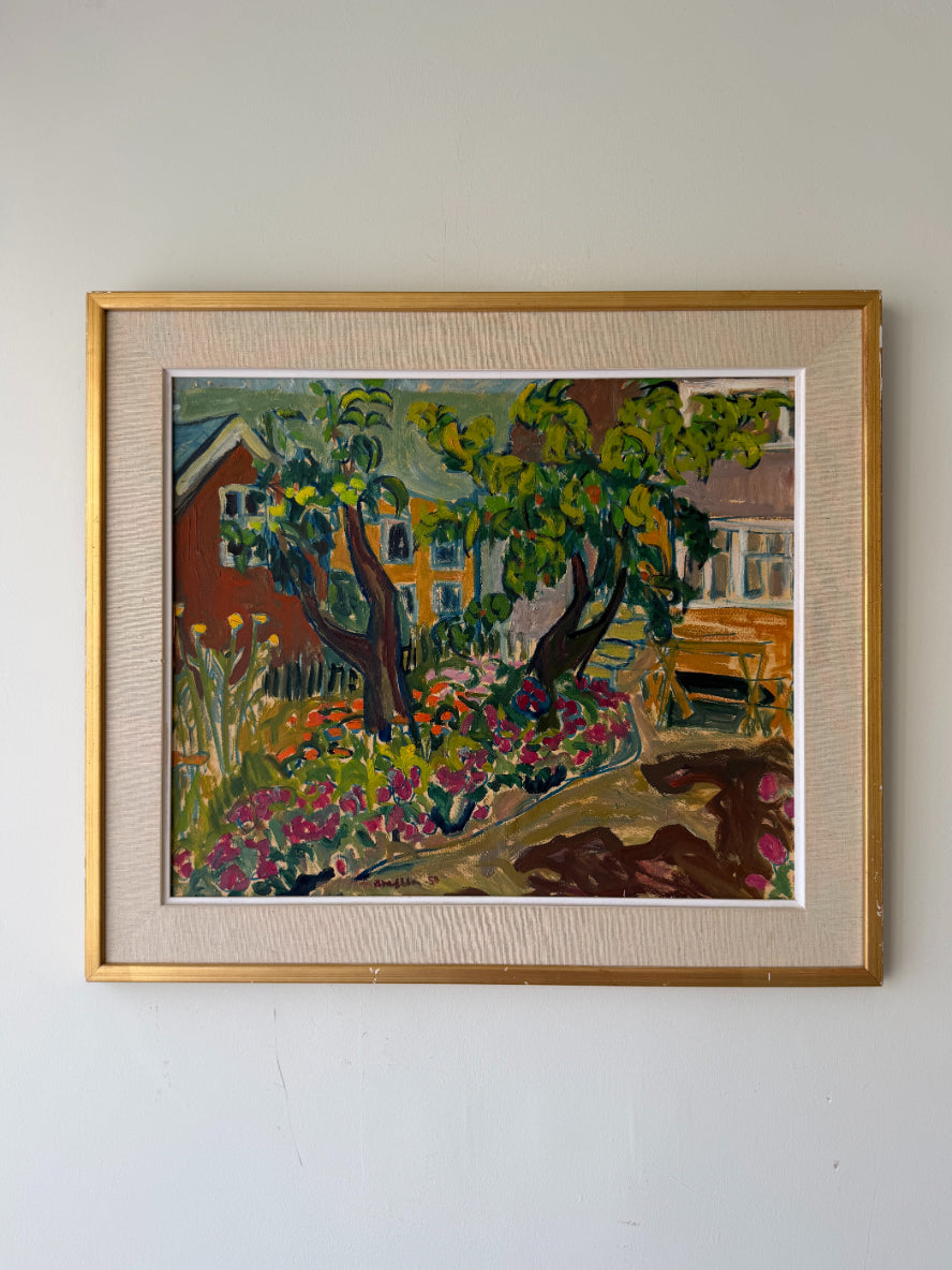 A framed vintage impressionist landscape painting of a garden with trees, flowers, and houses. Available at Hue. 