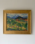 Framed vintage oil painting of a landscape with trees, fields and distant snow-capped mountains and small village settlement. Available at Hue,