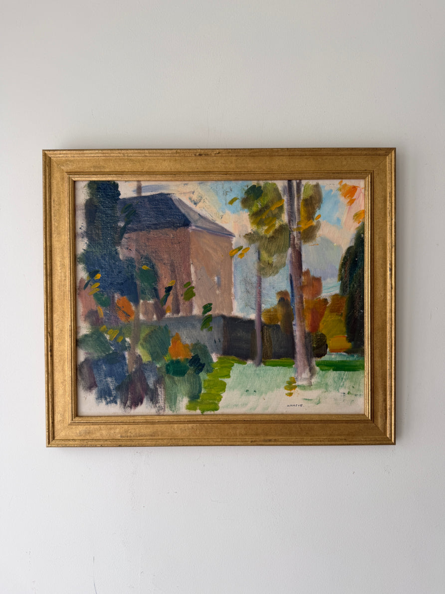 A framed vintage impressionist landscape painting of a house and trees, housed in a gold frame. Available at Hue.