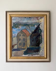 A framed vintage oil painting of a coastal landscape with a house, water, and dark trees. The artwork features a beige house with a red roof, blue water, and dark green/black foliage, enclosed in a gold and brown frame. Available at Hue.