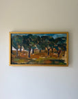 A framed vintage landscape painting featuring dark green trees and a brown ground. Available at Hue. 