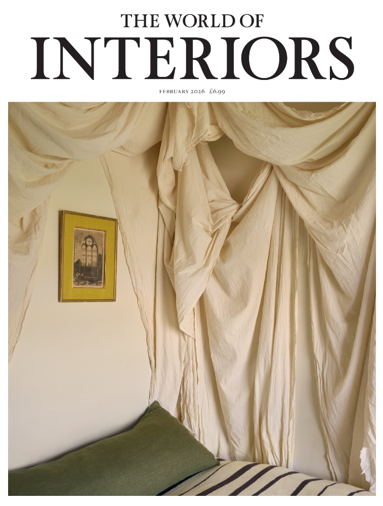 The World of Interiors February 2026 magazine cover featuring a softly draped interior with framed vintage art.
